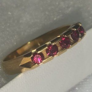 Elegant Gold Ring with Red Gemstones